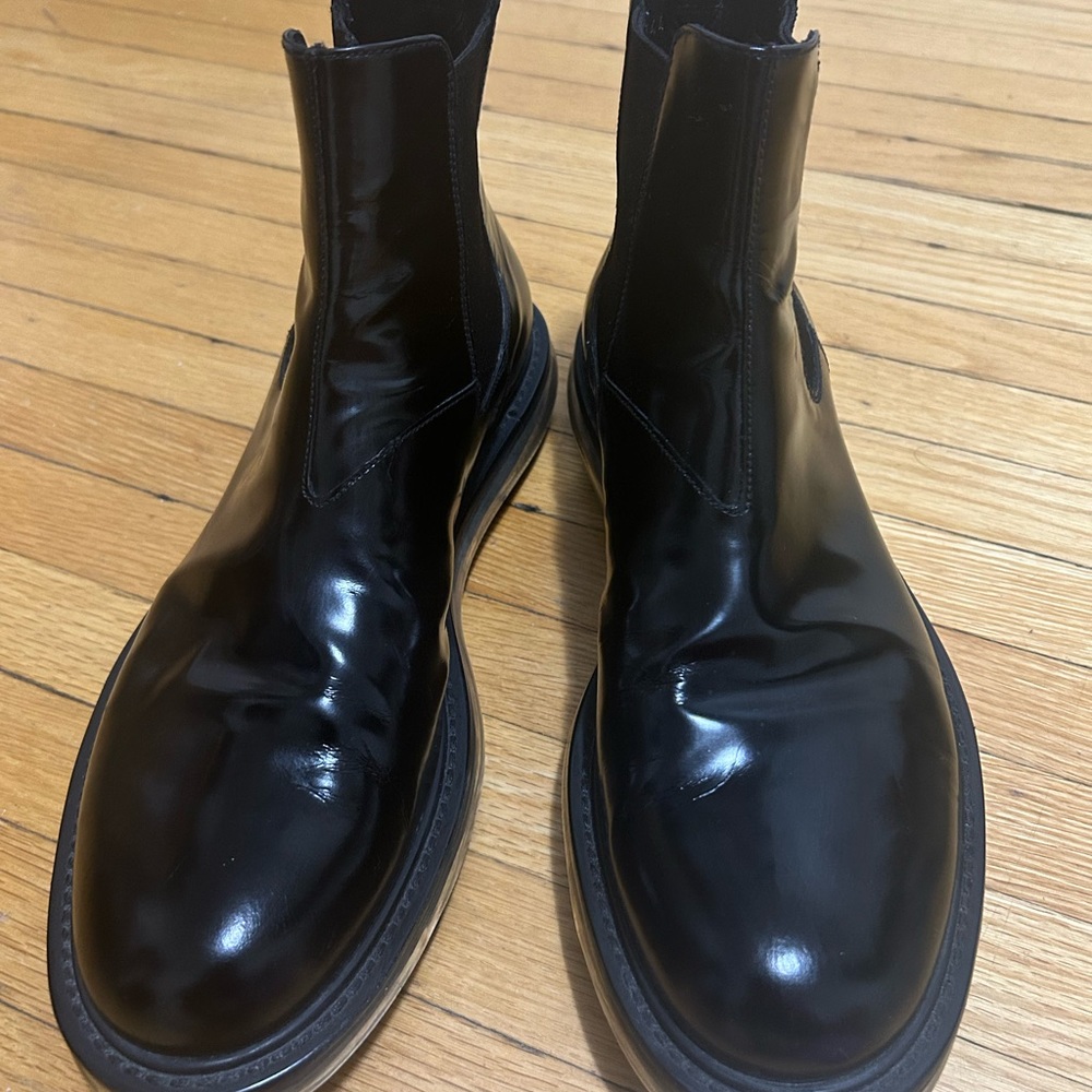 Prada Black Boots used a couple of times. Still in good condition.